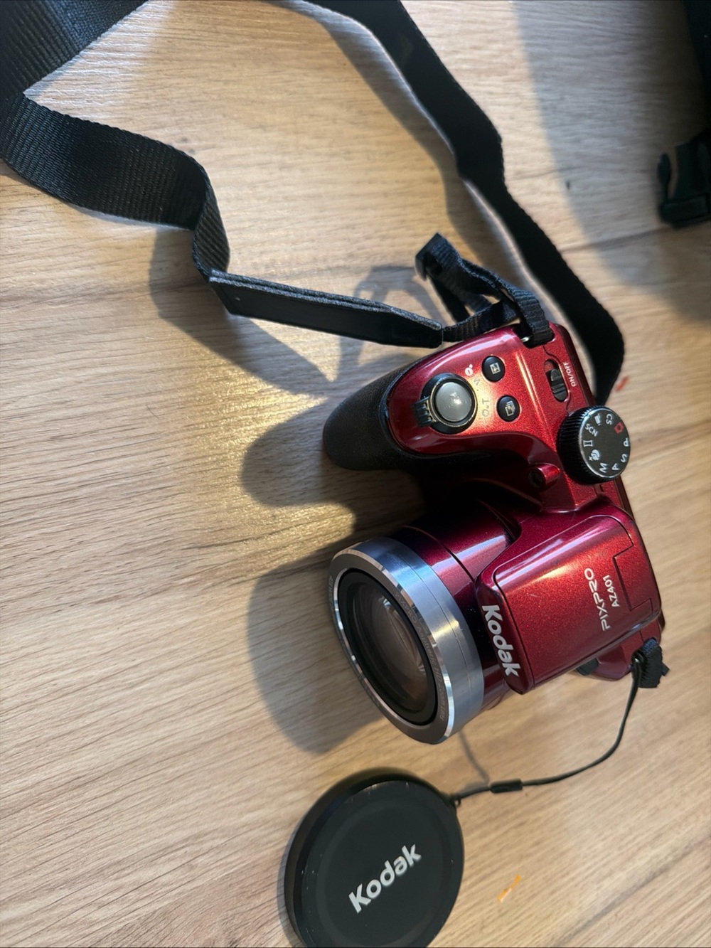Kodak red compact bridge camera with strap